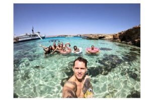 Malta: Comino, Gozo, Blue Lagoon, Crystal Lagoon and Caves Tour - Leaving Malta: St. Paul’s Bay to Comino Caves and Beaches